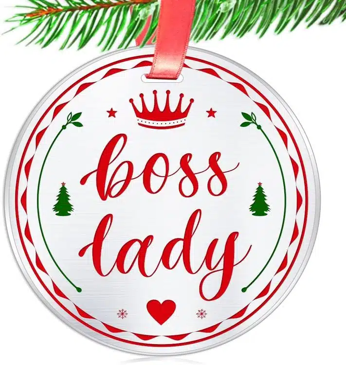 A picture of a Christmas ornament that says "Boss Lady"