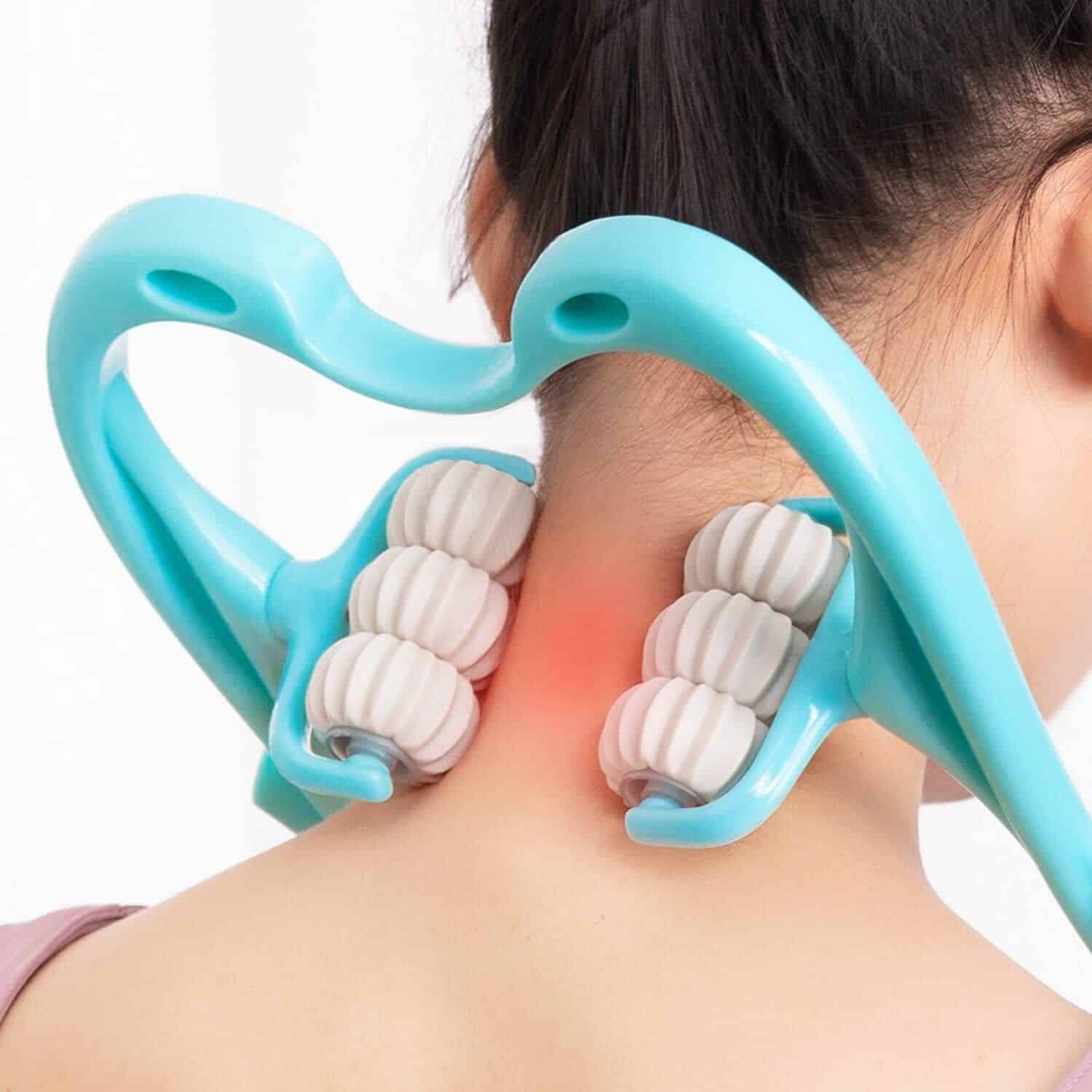 A picture of a woman using a neck massager
