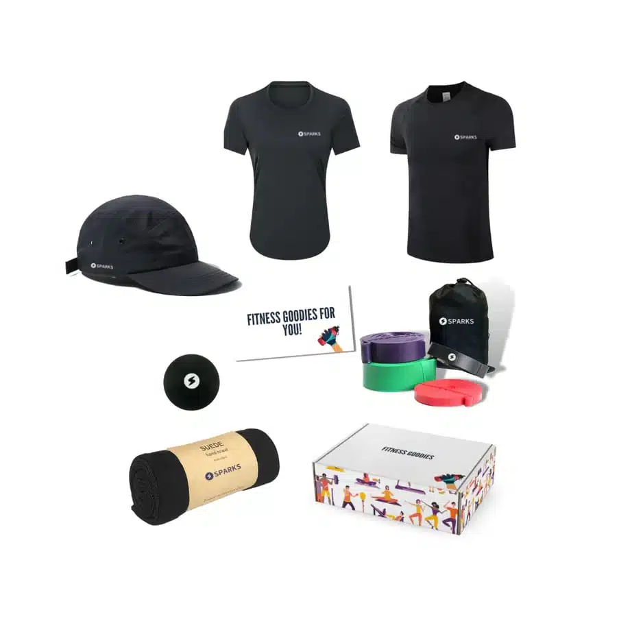 A picture of shirts, a hat, a box, towels, and bands